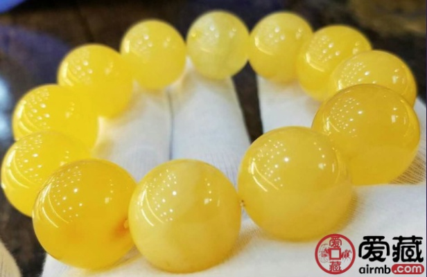 蜜蜡鸡油黄和妖孽哪个好? 蜜蜡鸡油黄和妖孽哪个好?